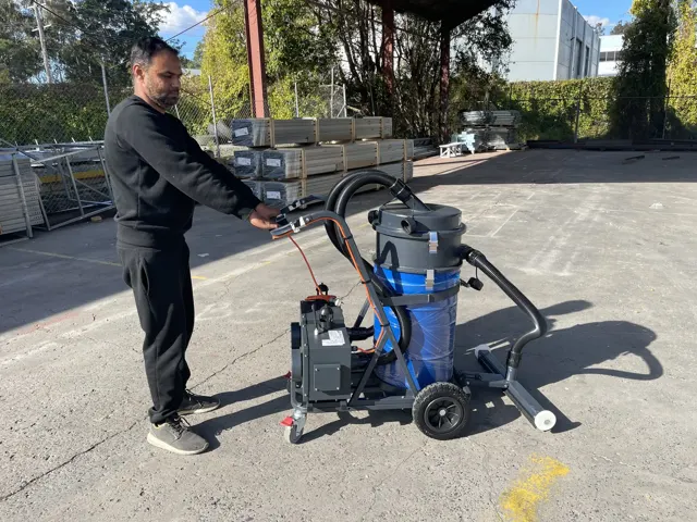 Dirt Eater Big Boss large HEPA industrial vacuum in action