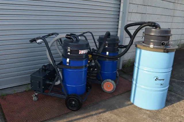 Dirt Eater HEPA industrial vacuum in action on a Houston jobsite