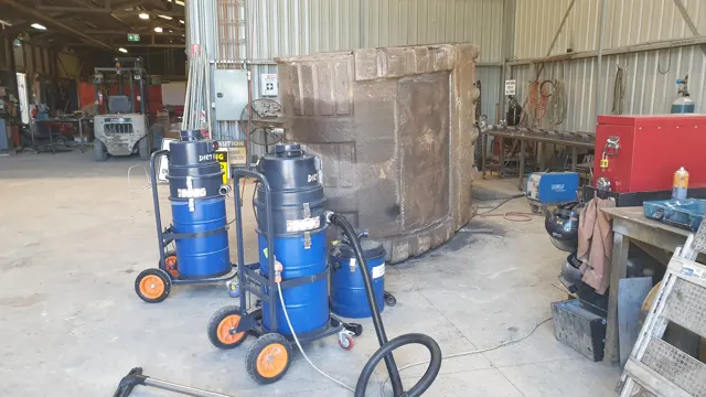 Dirt Eater HEPA industrial vacuum in action on a Houston jobsite