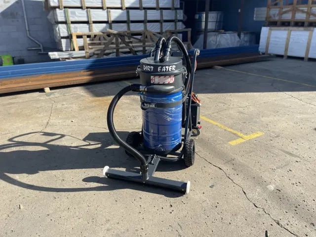 Dirt Eater Big Boss large HEPA industrial vacuum in action