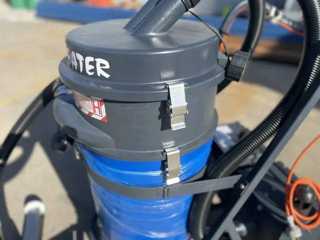 Dirt Eater HEPA industrial vacuum in action on a Houston jobsite