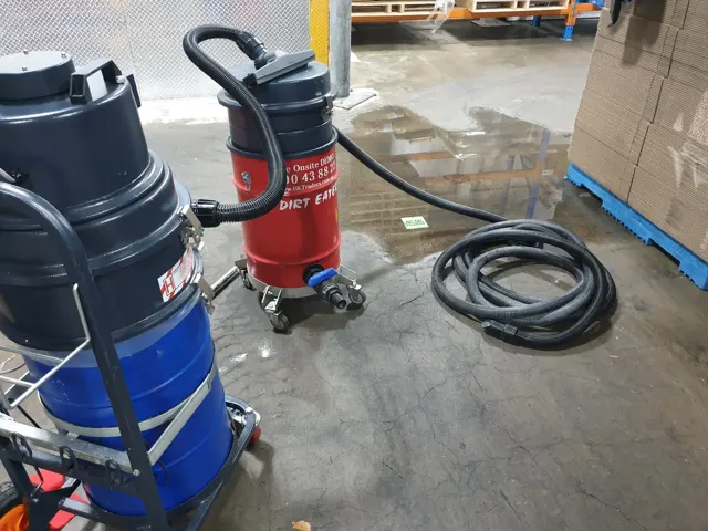 Dirt Eater HEPA industrial vacuum in action on a Houston jobsite
