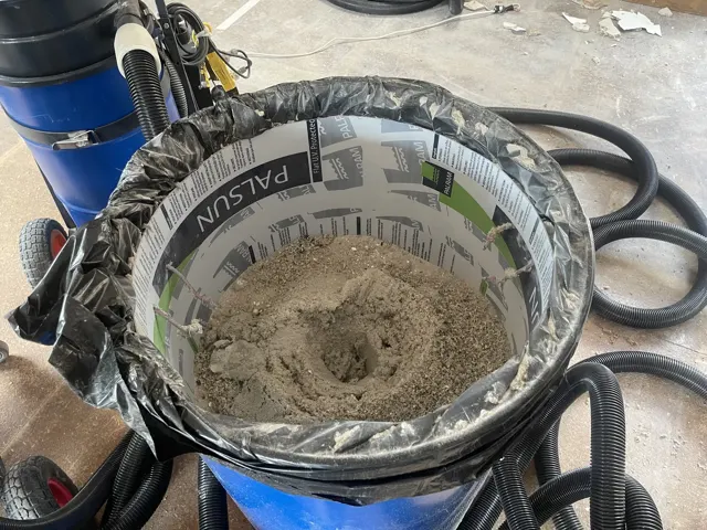 HireAVac HEPA industrial vacuum equipment collecting hazardous dust