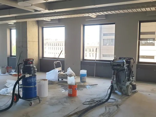 Dirt Eater HEPA industrial vacuum in action on a Houston jobsite