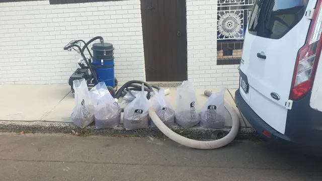 Dirt Eater HEPA industrial vacuum in action on a Houston jobsite