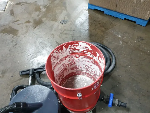 HireAVac HEPA industrial vacuum equipment collecting hazardous dust