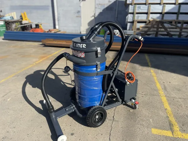 Dirt Eater Big Boss large HEPA industrial vacuum in action