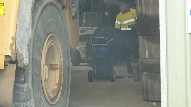 Dirt Eater HEPA industrial vacuum in action on a Houston jobsite