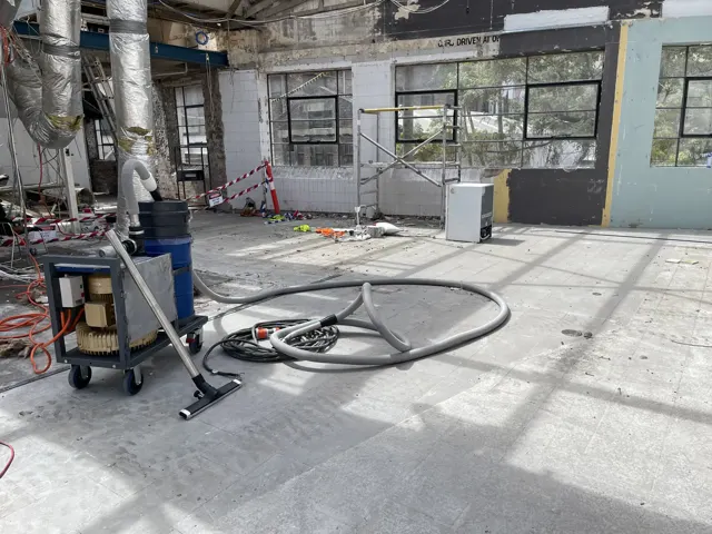 Dirt Eater Big Boss large HEPA industrial vacuum in action