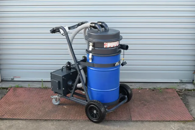 Dirt Eater Big Boss large HEPA industrial vacuum in action