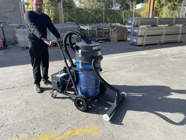 Dirt Eater Big Boss large HEPA industrial vacuum in action
