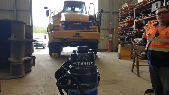 Dirt Eater HEPA industrial vacuum in action on a Houston jobsite