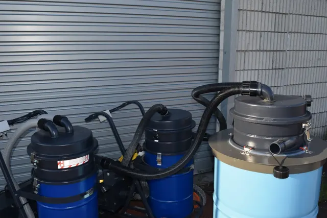 Dirt Eater Big Boss large HEPA industrial vacuum in action