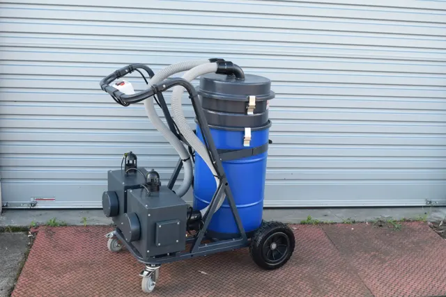 Dirt Eater Big Boss large HEPA industrial vacuum in action