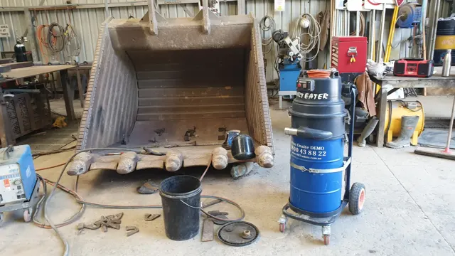 Dirt Eater HEPA industrial vacuum in action on a Houston jobsite