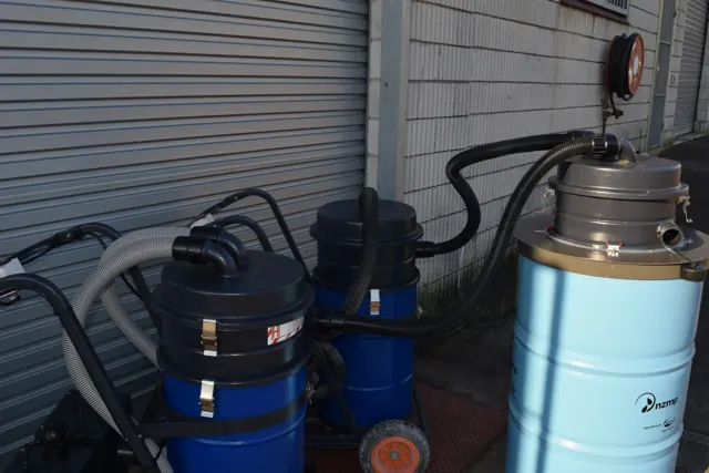 Dirt Eater Big Boss large HEPA industrial vacuum in action